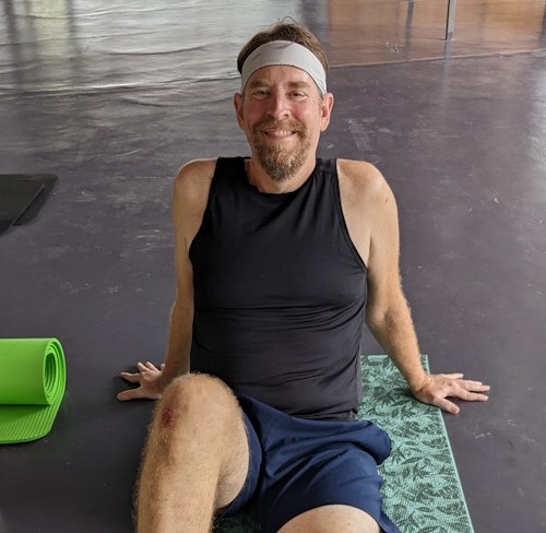 michael hixson doing yoga, about phuket serenity